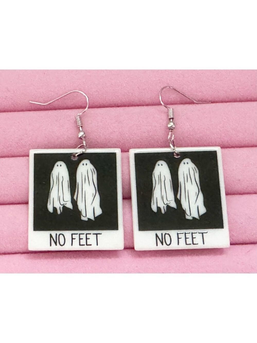 Beetlejuice "No Feet" square earrings hook back light wearing